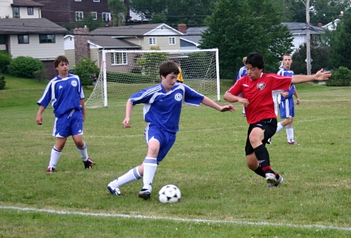 David playing soccer